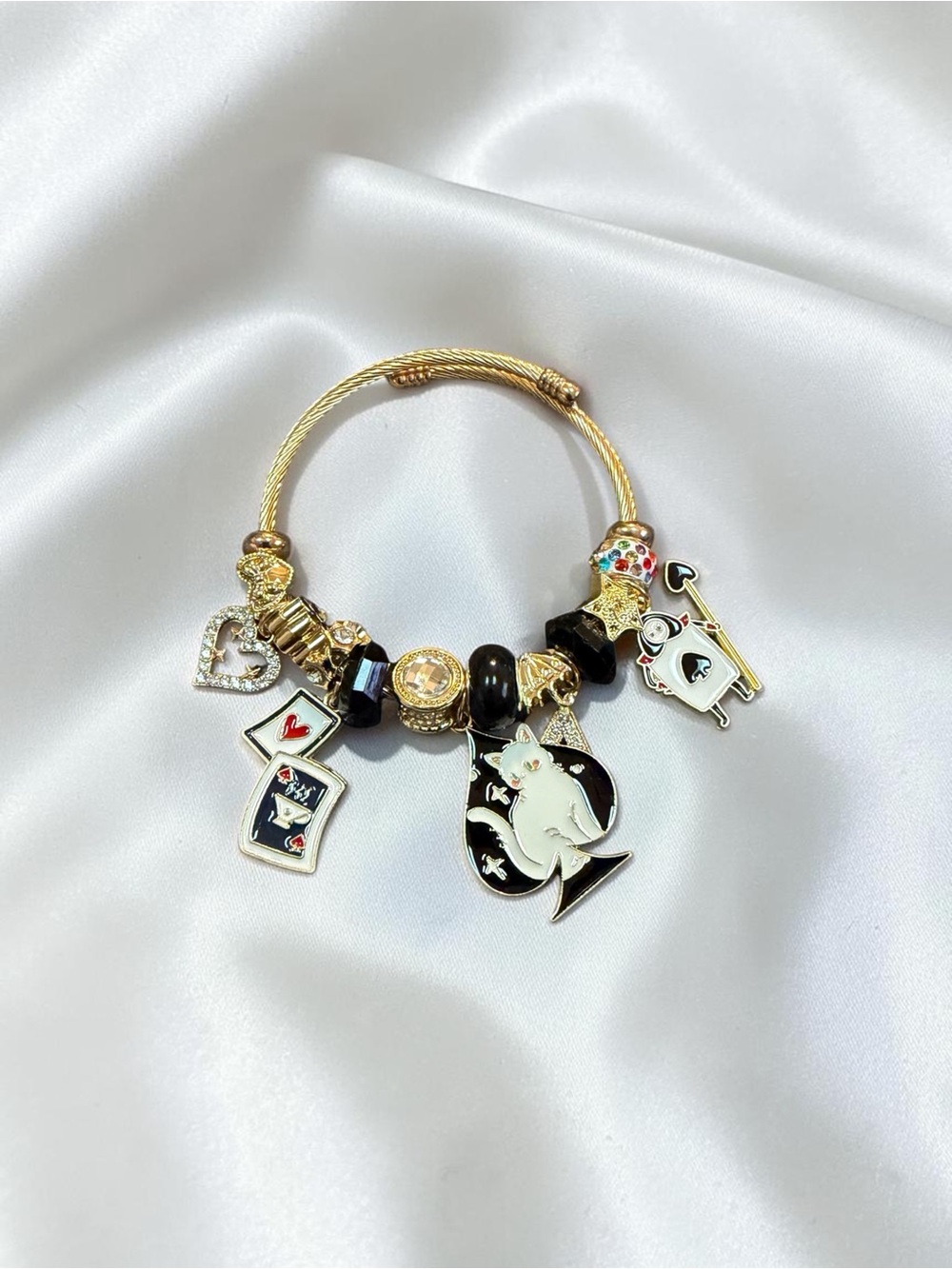 Gold-Tone Black & White Cat Charm Twisted Bangle Bracelet